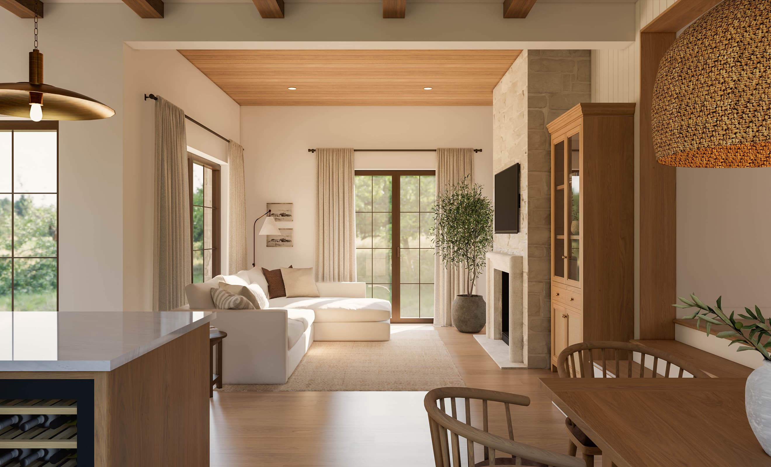 Dnevna soba z lesenim stopom, kamnitim kaminom in velikimi okni