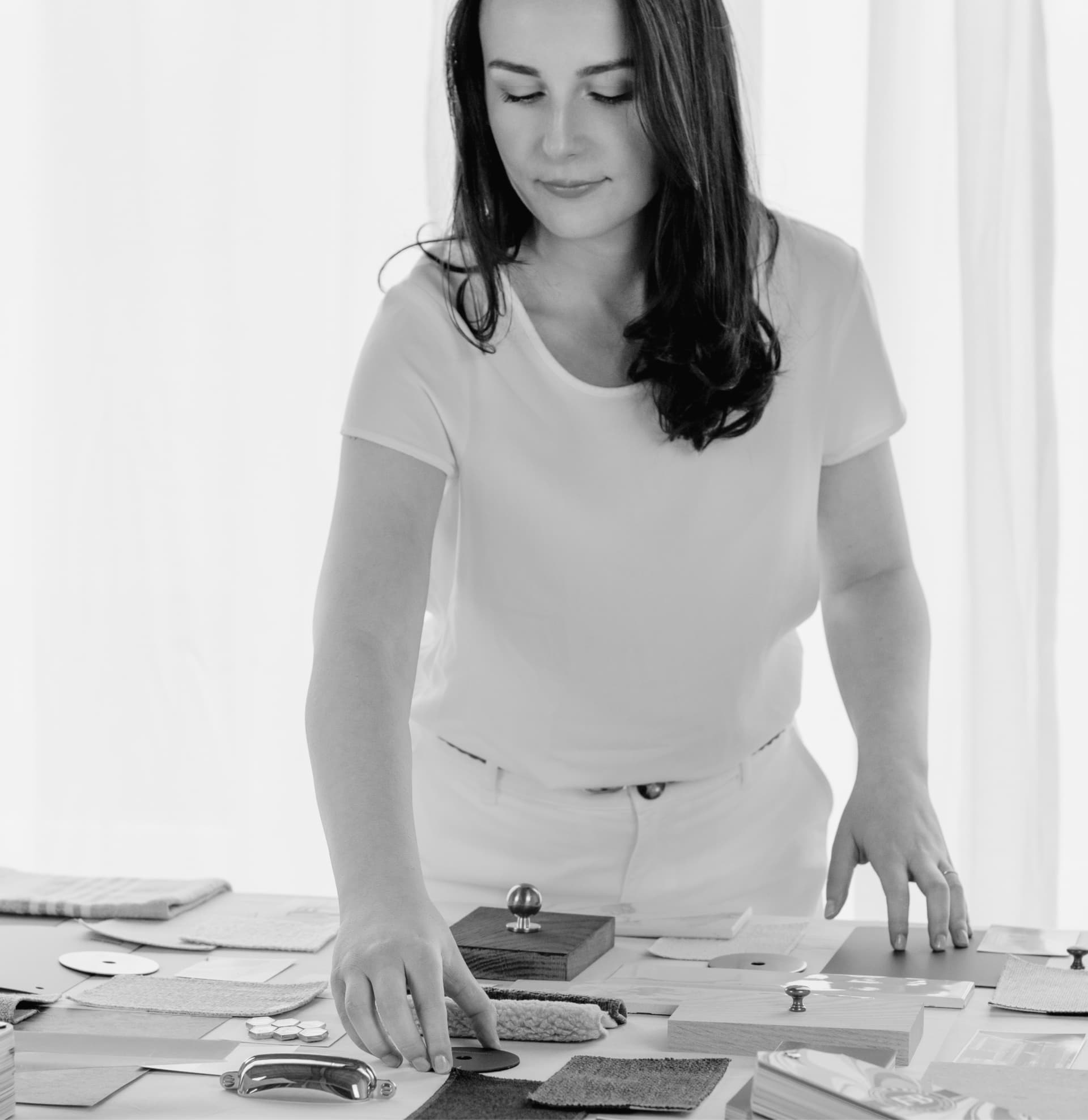 Interior designer preparing project presentation materials and samples