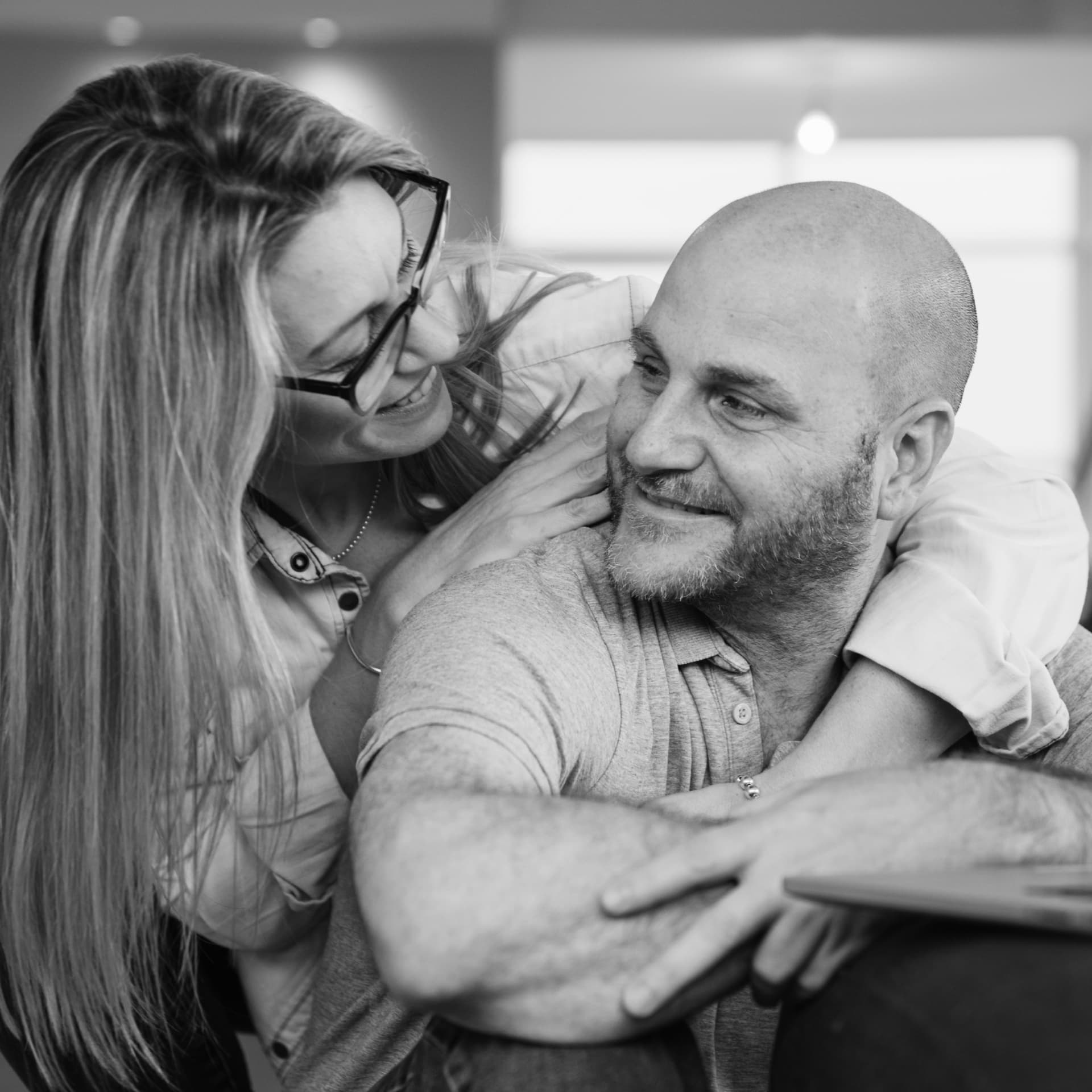 Couple smiling and enjoying the process of creating their new home